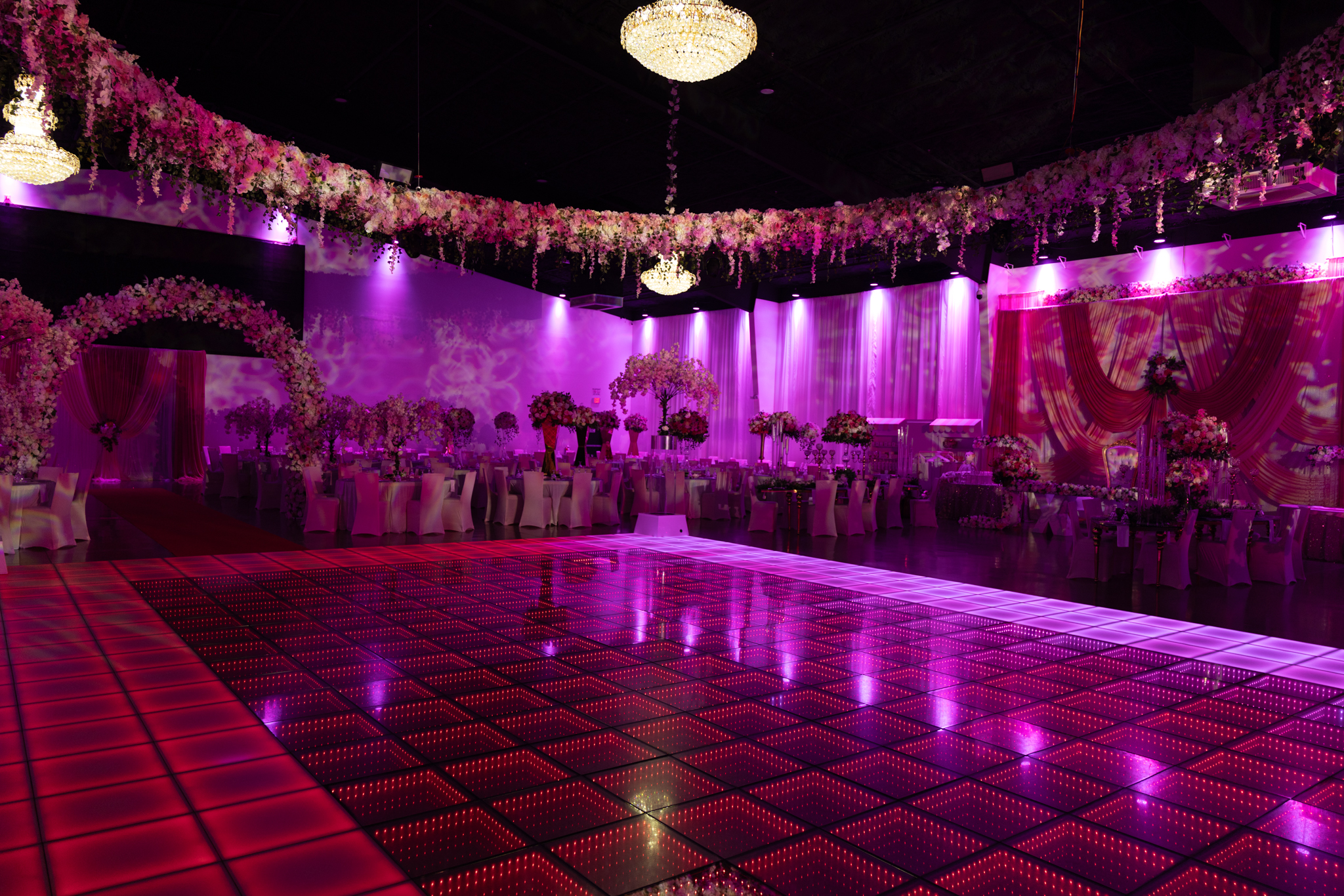 The illuminated dance floor at Club Ragazzi, dressed for a quincea&ntilde;era